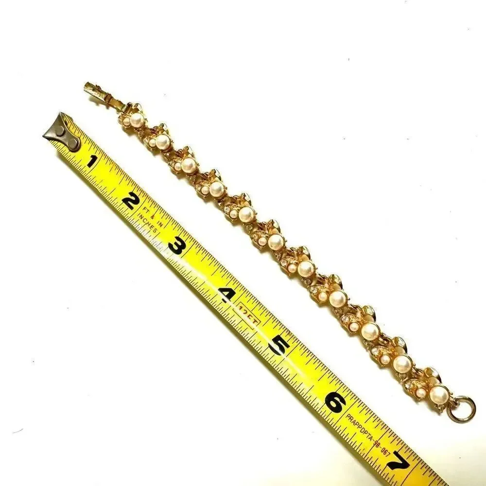 Gold tone faux pearl rhinestone bracelet